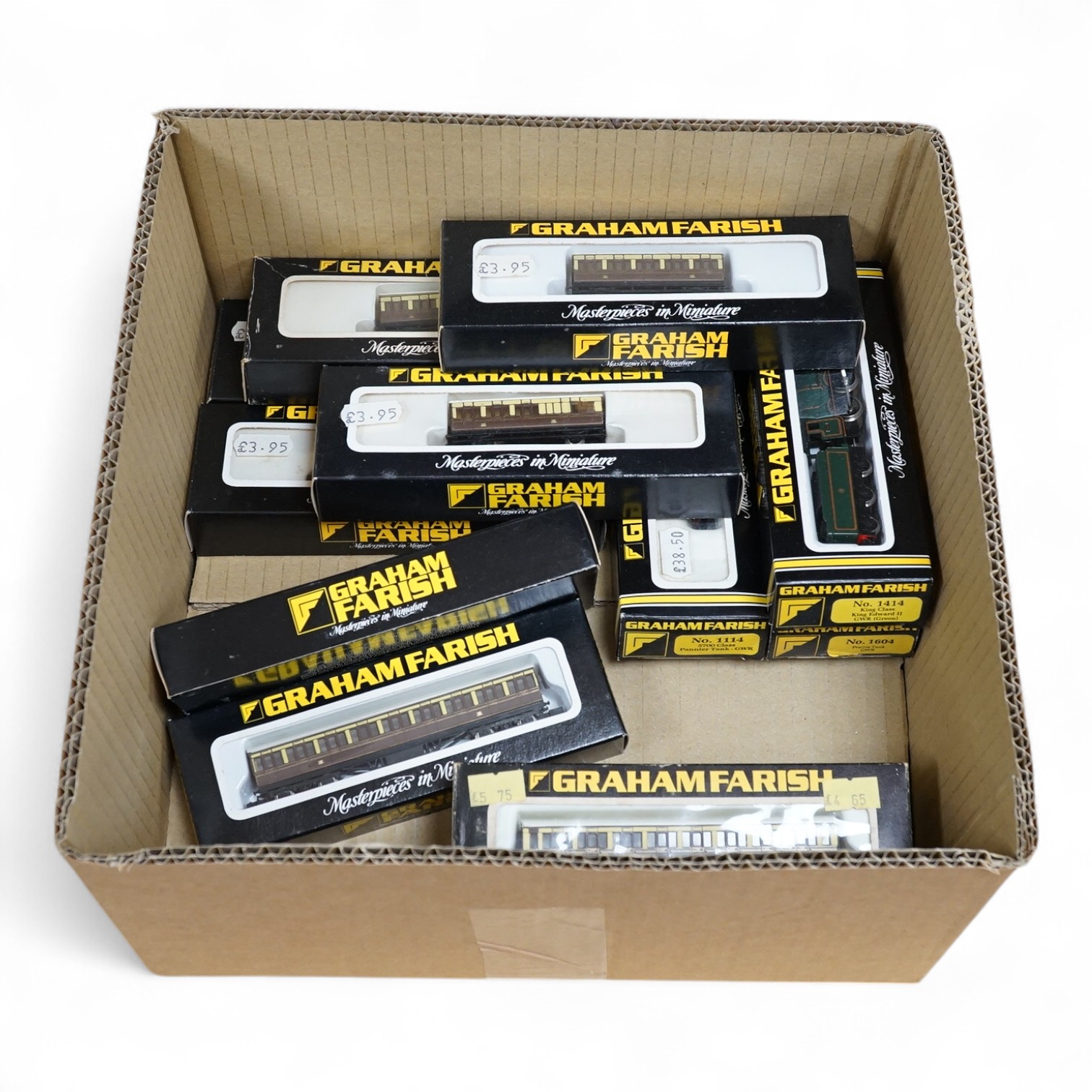 Twelve boxed Graham Farish N gauge GWR model railway, including three locomotives; a King Class King Edward II (1414), a Class 57xx 5768 (1114), and a Prairie Tank 3105 (1604), together with five 4-wheel coaches, and fou
